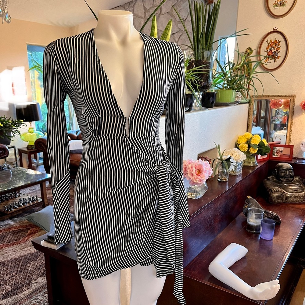 Faithfull The Brand; black and white striped mini wrap dress; size 2; slim fit;